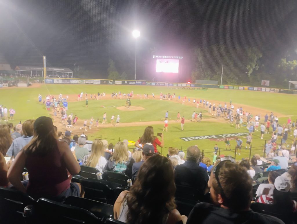 Kids run the bases after the game